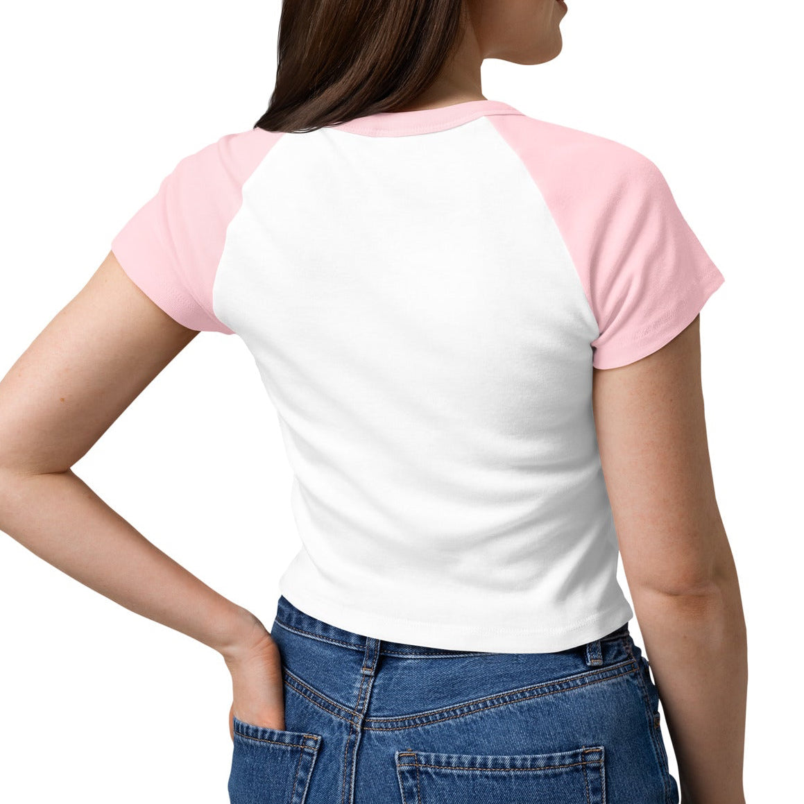 Woman wearing a white t-shirt with pink sleeves and blue jeans on a white background