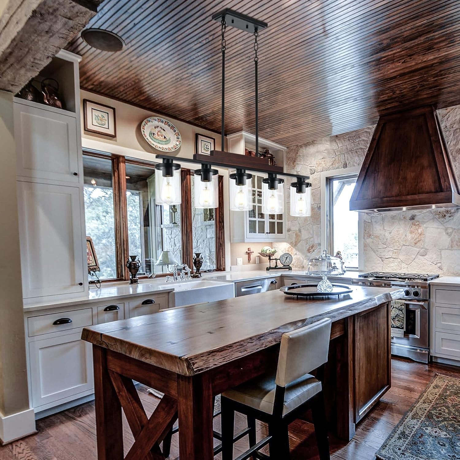 Modern kitchen with wooden island and white cabinets