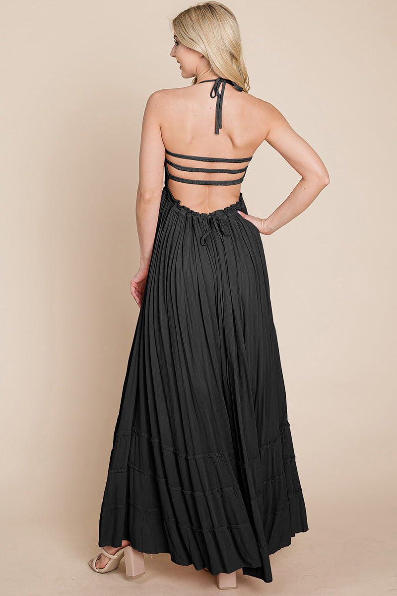 Women wearing a SMOCKED BOHO MAXI WITH PLEATS & OPEN BACK