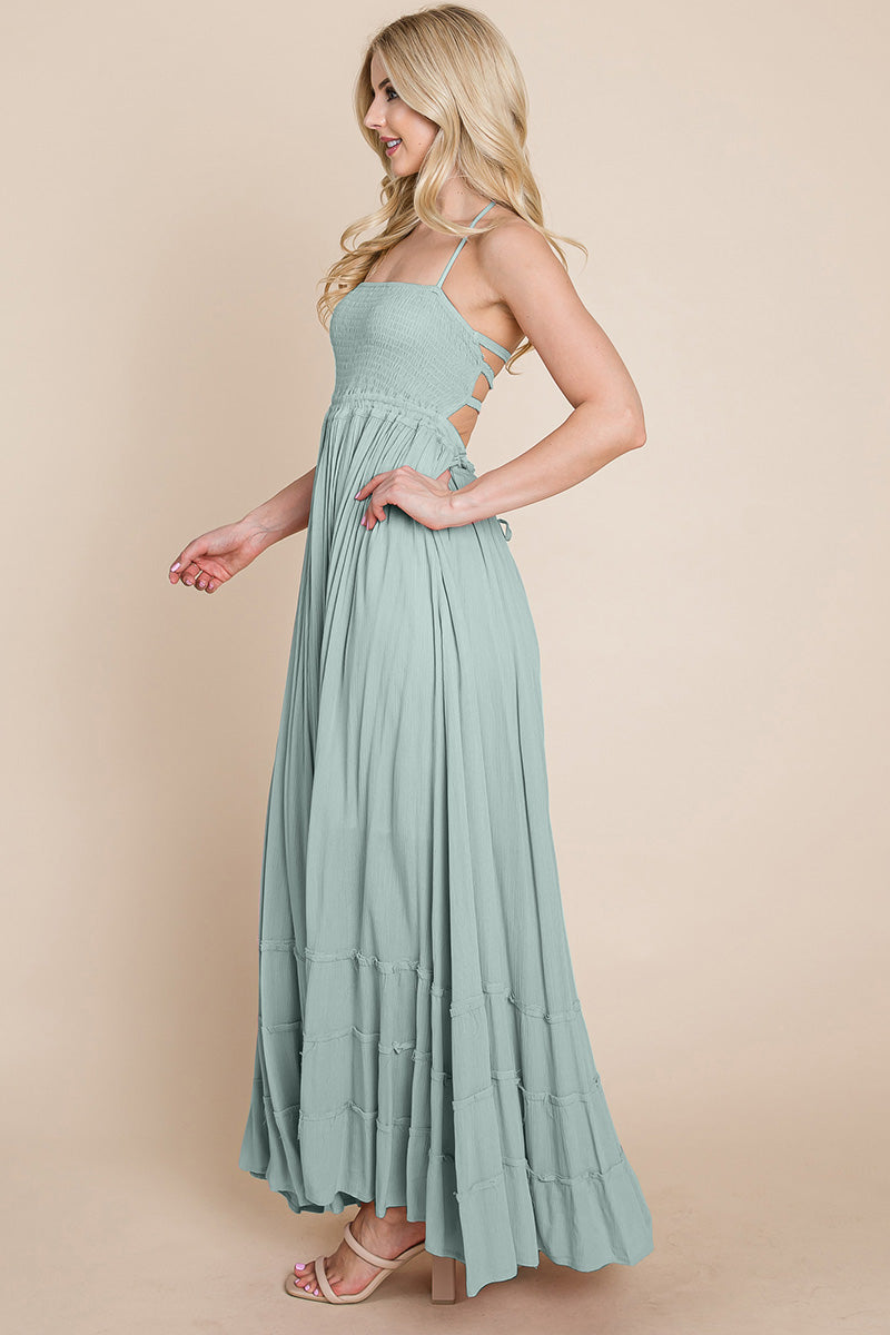 Woman wearing a light blue maxi dress