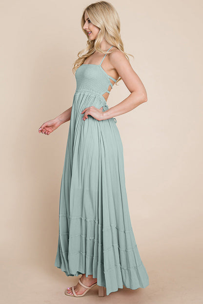 Woman wearing a light blue maxi dress