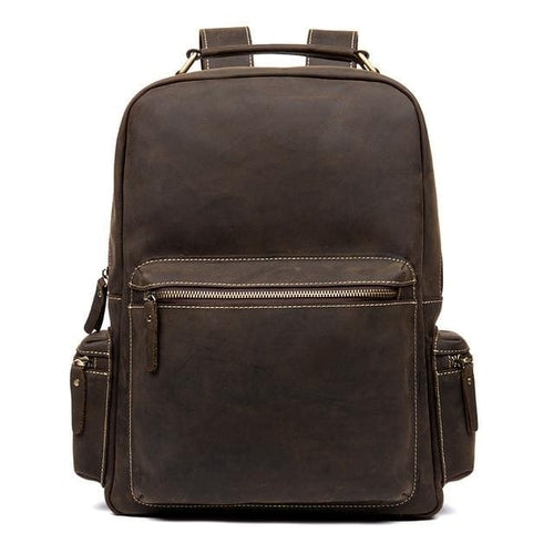 Brown leather backpack on a white background