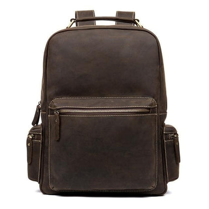 Brown leather backpack on a white background