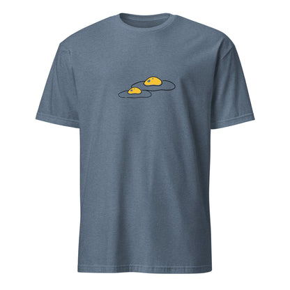 Blue t-shirt with a graphic of three yellow objects on a white background